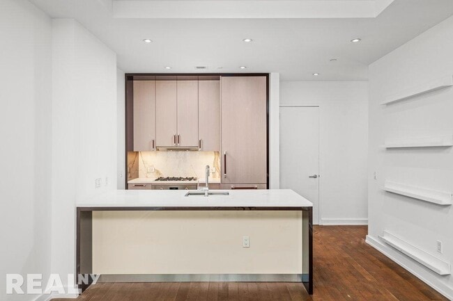 property at 261 W 25th St