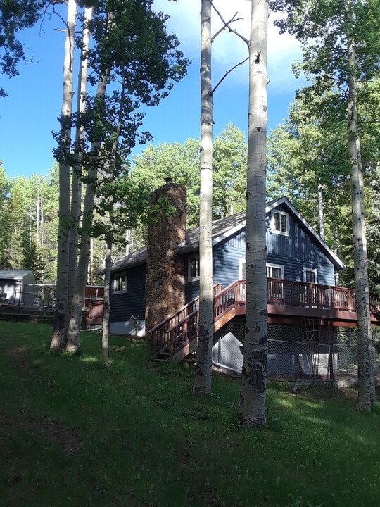 97 Pawnee Trl, Unit Bottom of Mtn Home in Evergreen, CO - Building Photo