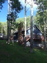 97 Pawnee Trl, Unit MtnLiving- includes Utils in Evergreen, CO - Building Photo - Building Photo