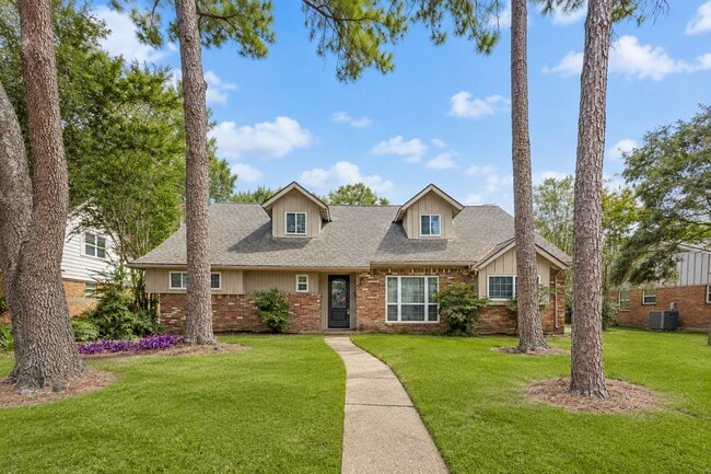 property at 10615 Piping Rock Ln