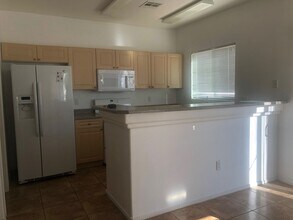 8745 Tomnitz Ave in Las Vegas, NV - Building Photo - Building Photo