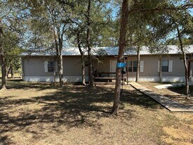 399 Pope Bend N, Unit 5-207 in Cedar Creek, TX - Building Photo