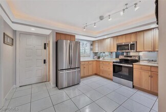 12945 Vanderbilt Dr in Naples, FL - Building Photo - Building Photo