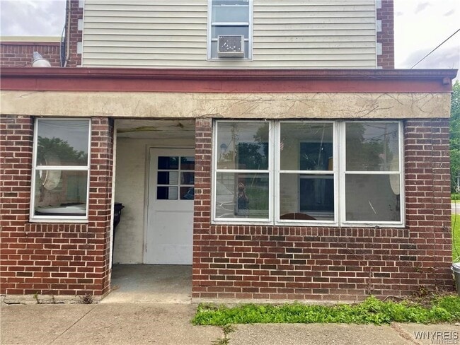 property at 8698 S Main St
