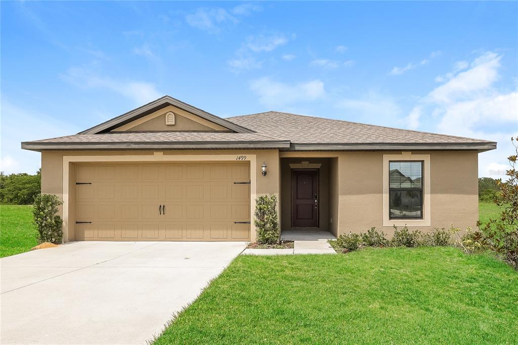 1499 Swan Lake Cir in Dundee, FL - Building Photo