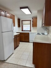 108 W Poplar St in Bloomfield, IA - Foto de edificio - Building Photo