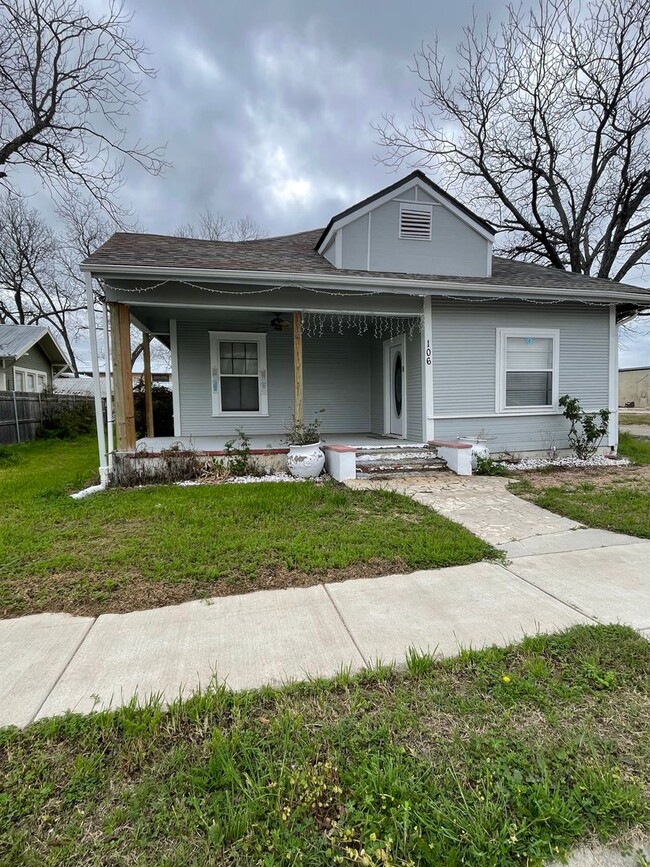 property at 106 E 3rd St