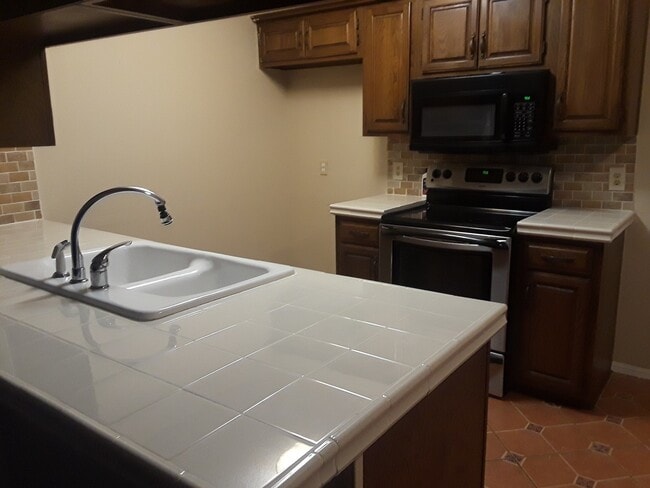 property at 9905-9905 E 22nd St