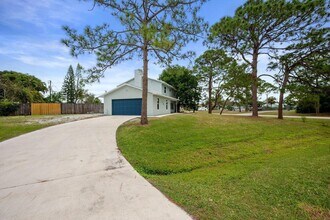 1741 SW Brisbane St in Port St. Lucie, FL - Building Photo - Building Photo