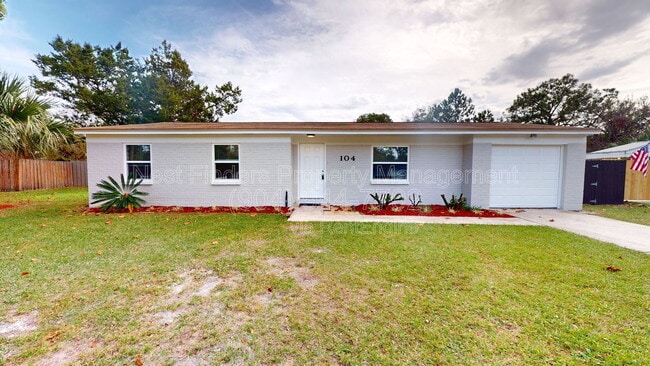 property at 104 Dolphin Blvd E