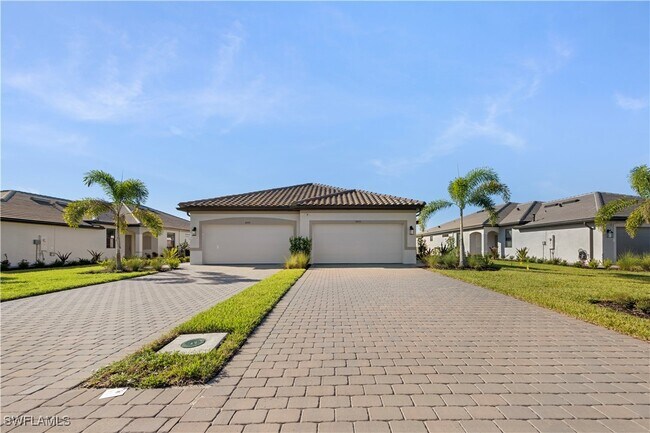 19573 Hinkley Dr in Estero, FL - Building Photo - Building Photo