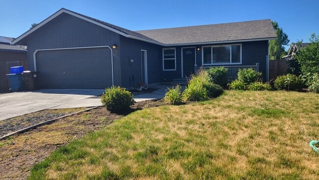 property at 3016 SW Pumice Pl