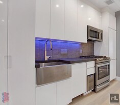 STANTON ST., Unit 4H in New York, NY - Building Photo