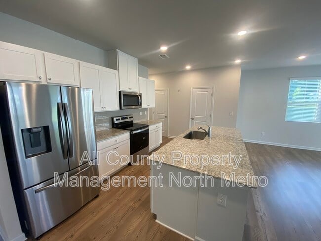 5340 Melbourne Ln in Flowery Branch, GA - Building Photo - Building Photo