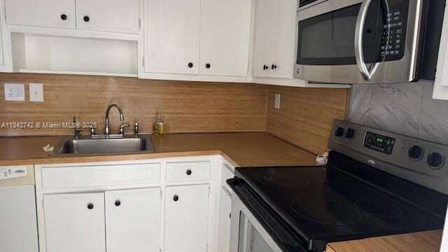 1475 NE 125th Terrace, Unit 414K in North Miami, FL - Building Photo - Building Photo