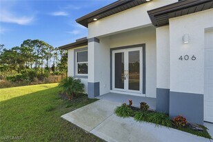 406 Genoa Ave S in Lehigh Acres, FL - Building Photo