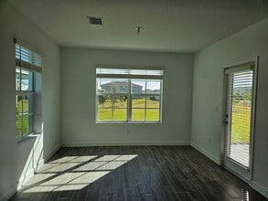 19672 WHISPERING CREEK Rd in The Acreage, FL - Building Photo - Building Photo