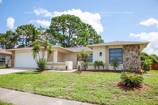8022 Idle Briar Ln in Port Richey, FL - Foto de edificio - Building Photo