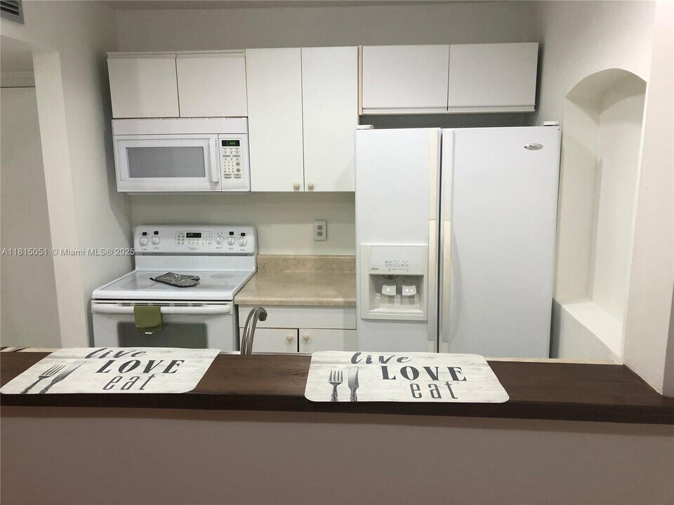 10001 W Atlantic Blvd, Unit 224 in Coral Springs, FL - Building Photo
