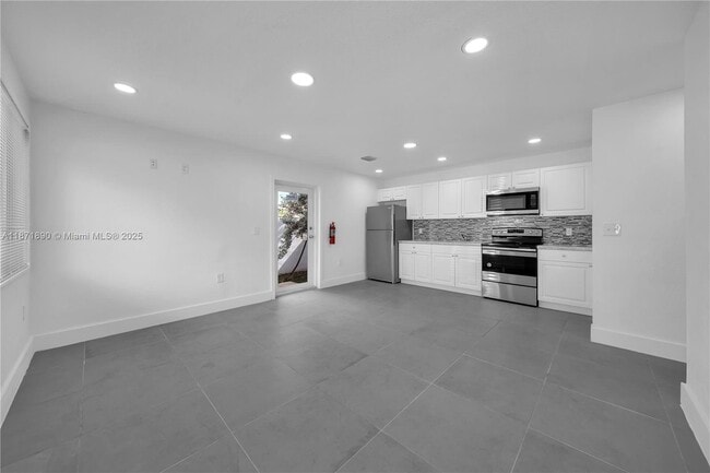 property at 3737 NW 20th Ave