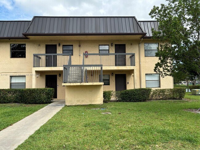 property at 9230 NW 1st St