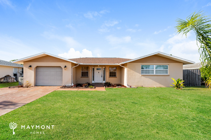 7839 Kelpie Dr in Port Richey, FL - Building Photo