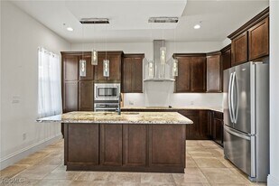 21460 Strada Nuova Circle in Estero, FL - Building Photo