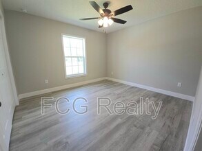 3328 W Naegelia Pl in Citrus Springs, FL - Building Photo - Building Photo