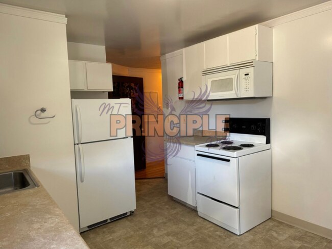 property at 218 E 3rd St