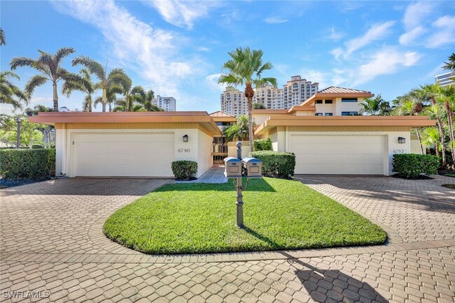 property at 6790 Pelican Bay Blvd