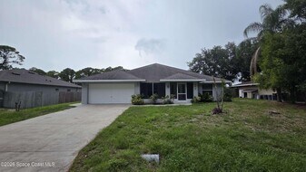 296 Croquet Ave NE in Palm Bay, FL - Building Photo