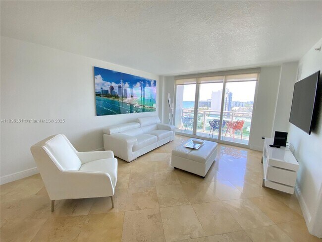 property at 6917 Collins Ave