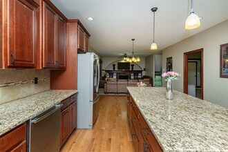 8700 Wooded Point Dr in Johnston, IA - Building Photo - Building Photo