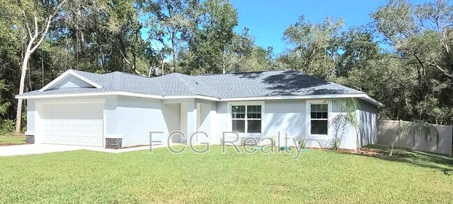 9115 N Sandree Dr in Citrus Springs, FL - Building Photo - Building Photo