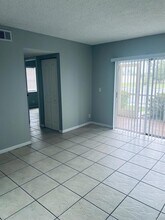 1564 SE Royal Green Cir, Unit 103 in Port St. Lucie, FL - Building Photo - Building Photo