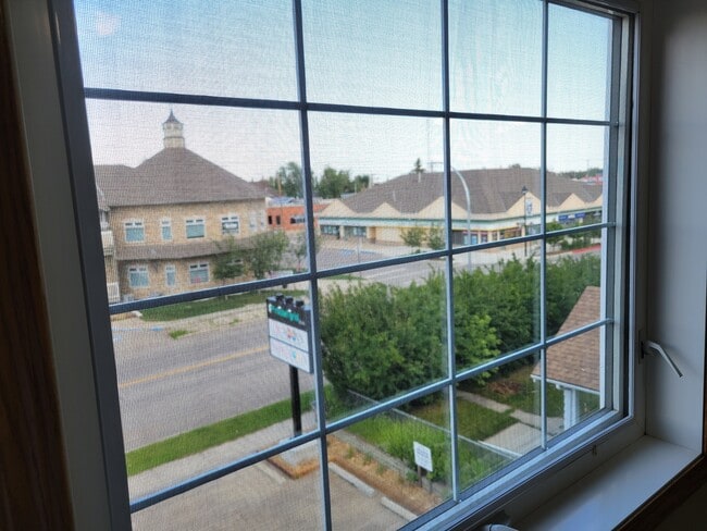 property at 307-303 Avenue - 202 Ave