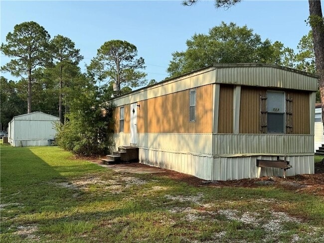 property at 64096 Mangano Rd