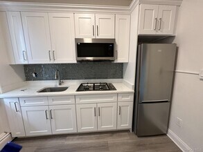 117 Plandome Rd in Manhasset, NY - Building Photo - Building Photo