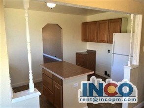 1001 S Eliot St-Unit -A in Denver, CO - Foto de edificio - Building Photo