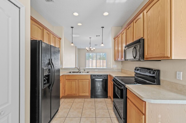 12923 Scout Ct in Grand Island, FL - Building Photo - Building Photo