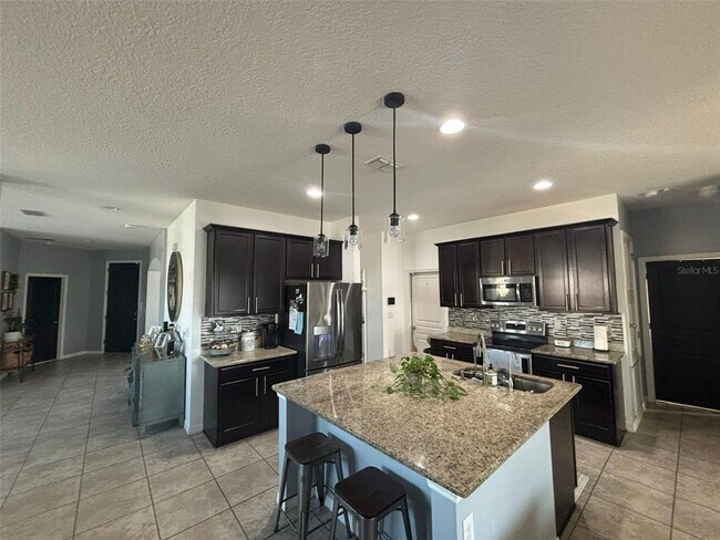 1000 Vicenza St in St. Cloud, FL - Building Photo - Building Photo