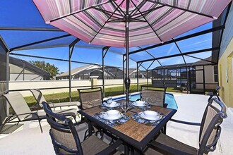 8160 Fan Palm Way in Kissimmee, FL - Foto de edificio - Building Photo