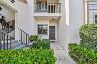 1103 Duncan Cir, Unit 104 in Palm Beach Gardens, FL - Foto de edificio - Building Photo