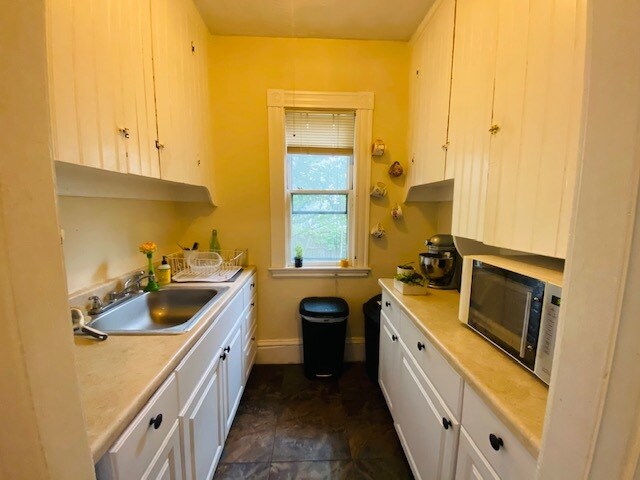 31 Stone Ave, Unit 1T in Somerville, MA - Building Photo