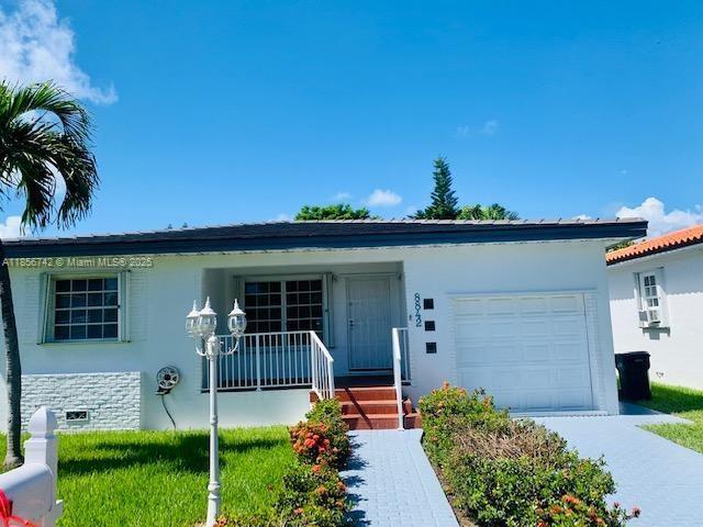 8842 Carlyle Ave in Surfside, FL - Building Photo