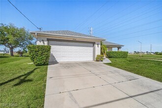 2324 NE Juanita Pl in Cape Coral, FL - Building Photo - Building Photo