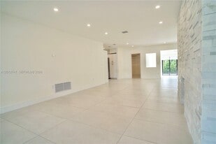 8811 Carlyle Ave in Surfside, FL - Building Photo