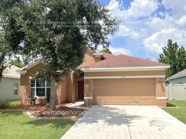 property at 11250 82nd St E