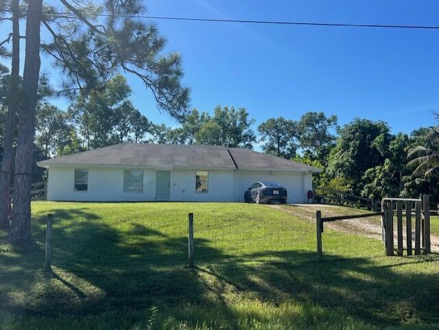 17680 93rd Rd N in The Acreage, FL - Building Photo