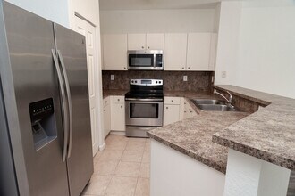 5108 SE Mariner Garden Cir in Stuart, FL - Building Photo - Building Photo